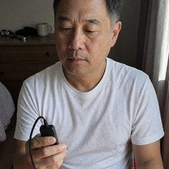 Man sitting on the EMBRA mat